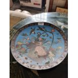 A pair of 20th Century Chinese enamelled plates, one decorated Cranes, the other basket of flowers,