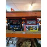 Three Burago model cars and others