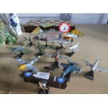 A selection of model aircraft on stands, a selection of pennants and a chess board