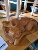 A modern carved wooden cat