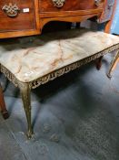A vintage onyx oblong coffee table on gilt metal base
