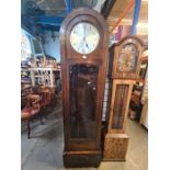 A plain 1920s/1930s long case clock