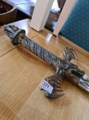 A reproduction Excalibur style sword, the handle decorated dragon