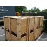 Four wooden packing crates with lids