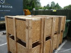 Four wooden packing crates with lids