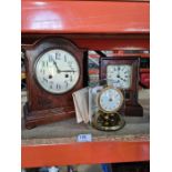 Set of wooden mantle clocks (2) and a small brass domed example