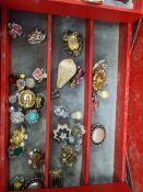 Vintage Red leather jewellery case containing vintage paste set costume jewellery by various makes i