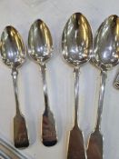 Silver Victorian flatware comprisng of two dessert spoons and two serving spoons. Various hallmarks