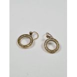 Pair 9ct yellow gold earrings of circular form, approx 1.44g