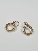 Pair 9ct yellow gold earrings of circular form, approx 1.44g