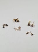 Collection of 9ct yellow metal and other stud earrings to incl. pearl, amethyst and sapphire example
