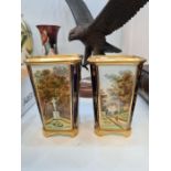 A pair of hand painted Coalport vases of square form, 12cms