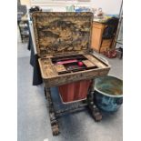 A Cantonese export lacquer work table, 19th Century, with fitted interior and lower long drawer on s