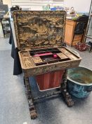 A Cantonese export lacquer work table, 19th Century, with fitted interior and lower long drawer on s