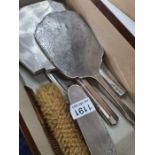 Silver dressing table items to include two brushes, a comb and a hand mirror by William Neale and So