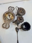 Silver cruet set items, as found, two having Bristol Blue inserts, and decorative feet, and scallope