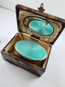 A superb cased silver and enamel backed brush having a pretty turquoise enamel, and gadrooned border