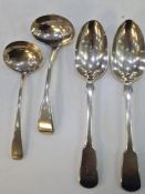 A pair of Georgian silver serving spoons hallmarked London 1834, John, Henry and Charles Lias. Also