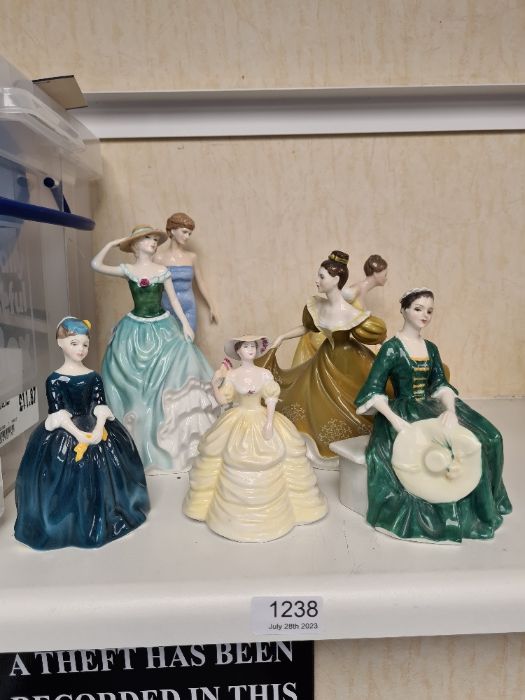 Seven Royal Doulton lady figures
