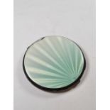 A pretty silver enamel compact having turquoise ombre guilloche enamel (slight damage to one side),