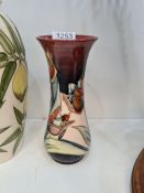 A Modern Moorcroft vase decorated flowers, 21cms approx