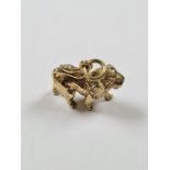 9ct yellow gold charm in the form of a lion, approx 2.65g