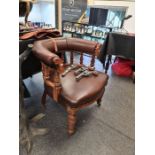A late Victorian walnut captain's desk chair having open back on turned front legs