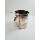 A Georgian silver mug having one handle and bonded design details. Hallmarked London 1816 Andrew Fog