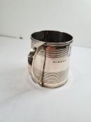 A Georgian silver mug having one handle and bonded design details. Hallmarked London 1816 Andrew Fog