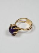 9ct yellow gold attractive dress ring set with an amethyst bead in 8 claw mount, on split design rin