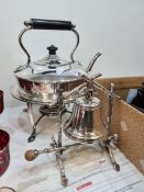 Anold silver plated table bell on twig style stand and a plated kettle on stand