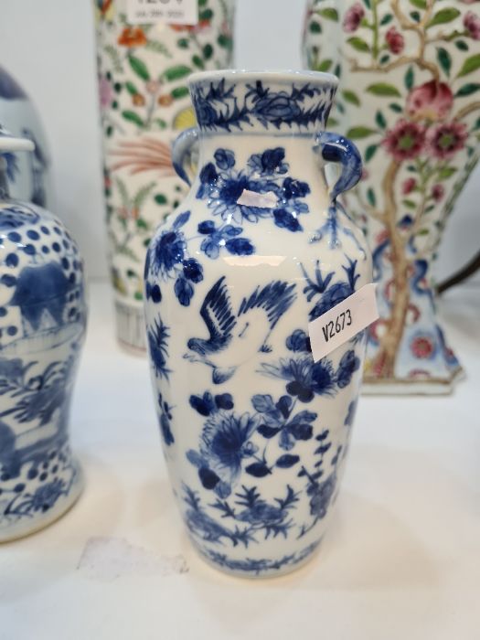 Two small Chinese blue and white vases and two Chinese export blue and white items - Image 5 of 21