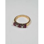 18ct yellow gold ruby and diamond half hoop ring set 3 round cut rubies and 2 diamonds in raised 4 c