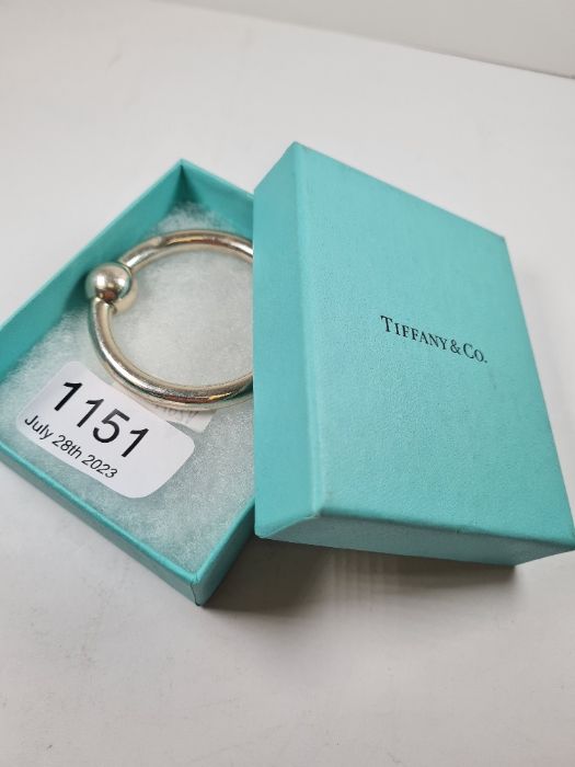 Tiffany and Co; a silver Tiffany and Co silver baby rattle, boxed