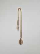 9ct yellow gold neck chain hung with 9ct gold mounted moonstone pendant, marked 375, maker TR approx