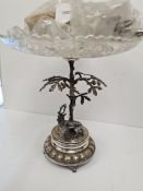 An attractive silver plated table centre piece of a stag standing beneath an Oak tree. With a cut gl