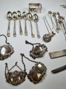 A silver lot comprising of decanter labels, a set of 6 rat tail teaspoons hallmarked Sheffield 1921