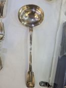 A large Georgian silver ladle having decorative embossed shell details terminating at the handle. Ha