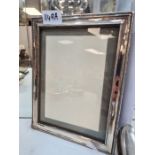 A silver fronted photo frame having pretty border 23 x 18cm approx hallmarked Birmingham 1914 G and