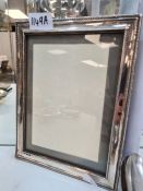 A silver fronted photo frame having pretty border 23 x 18cm approx hallmarked Birmingham 1914 G and