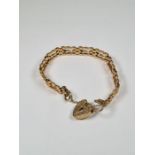 9ct yellow gold 3 bar gatelink bracelet, with heart shaped clasp and safety chain, with engraved det