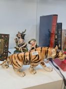 A Royal Dux prowling tiger and two Capodimonte figures (3)