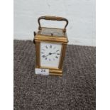 A French Brass carriage clock with striking movement