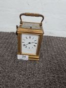 A French Brass carriage clock with striking movement