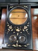 A late Victorian ebonised stereoscopic viewer having floral and bird decoration to top