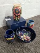 Moorcroft; three small vases and a bowl