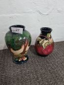 Moorcroft; two small vases with a crocus and tree pattern