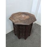 An octagonal folding occasional table