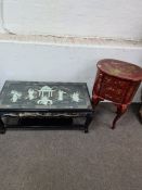 Chinese black lacquered coffee table with resin women in idyllic scene in high relief, and a small r
