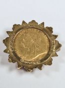 22ct gold Half Sovereign dated 1893, Victoria veiled head, G & TD, in 9ct gold decorative frame/broo